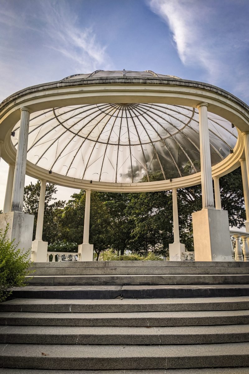 Beautiful atmosphere in the morning with large white gazebo at recreational park